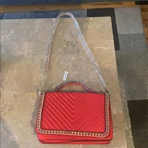 Red leather bag with gold chain